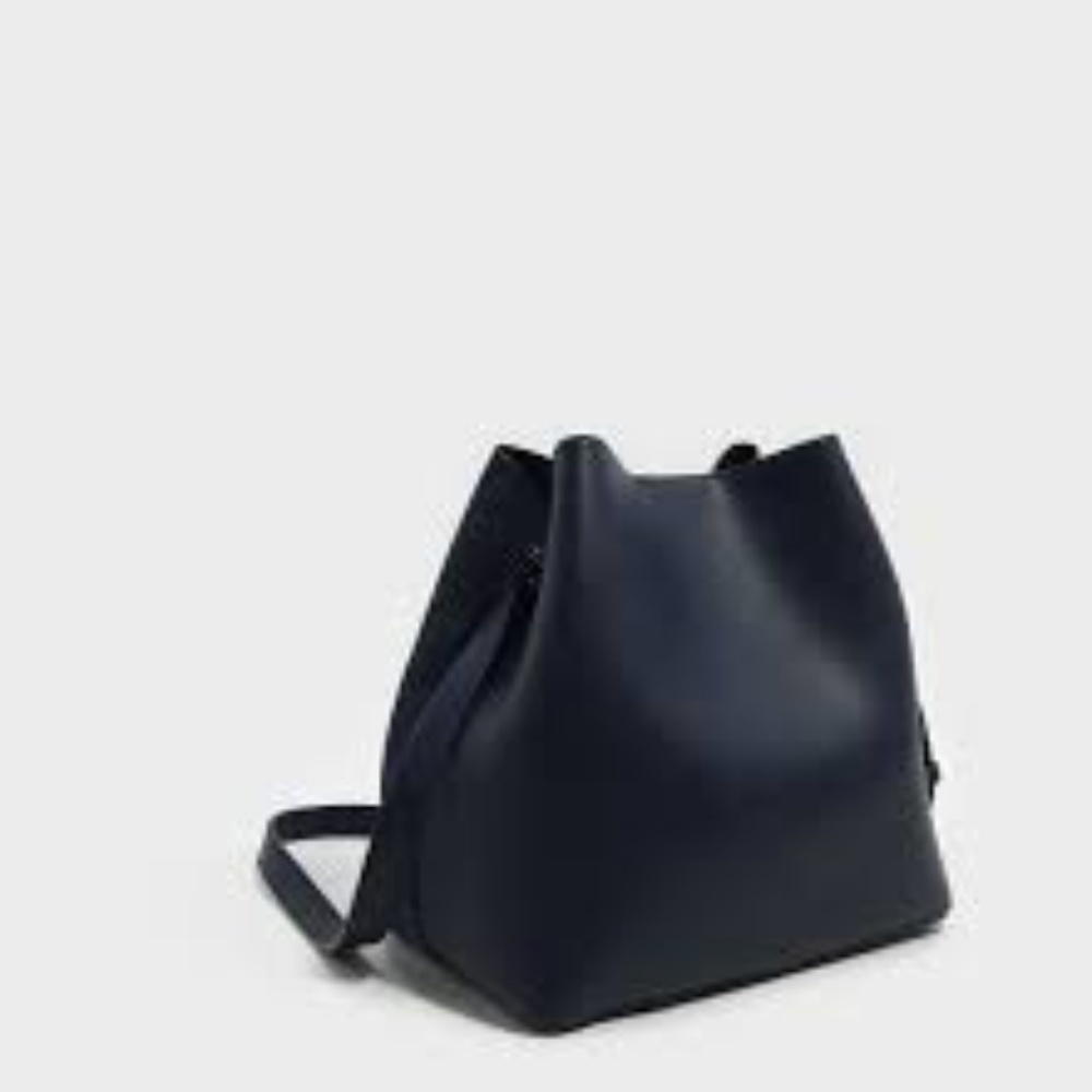 Charles and Keith Navy Purse + FREE poof keychain!